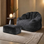 Poltrona relax a petalo nera con pouf in flanella