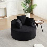 Poltrona lounge rotonda imbottita in velluto a coste nero con 3 cuscini; braccioli larghi e diametro 110 cm
