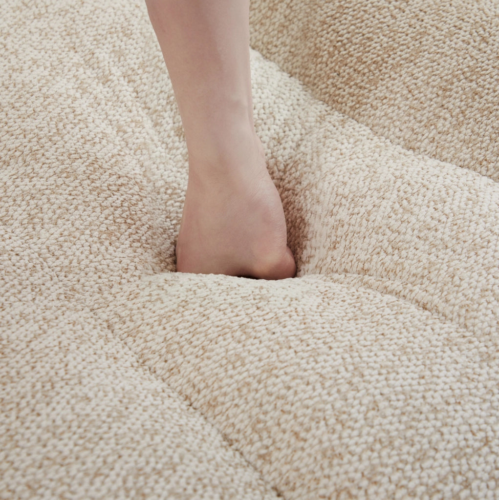 Divano modulare con ottomana in fleece beige e bianco
