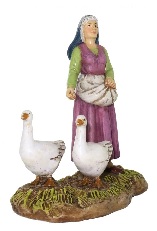 Pastorella con oche per presepe da 10 cm