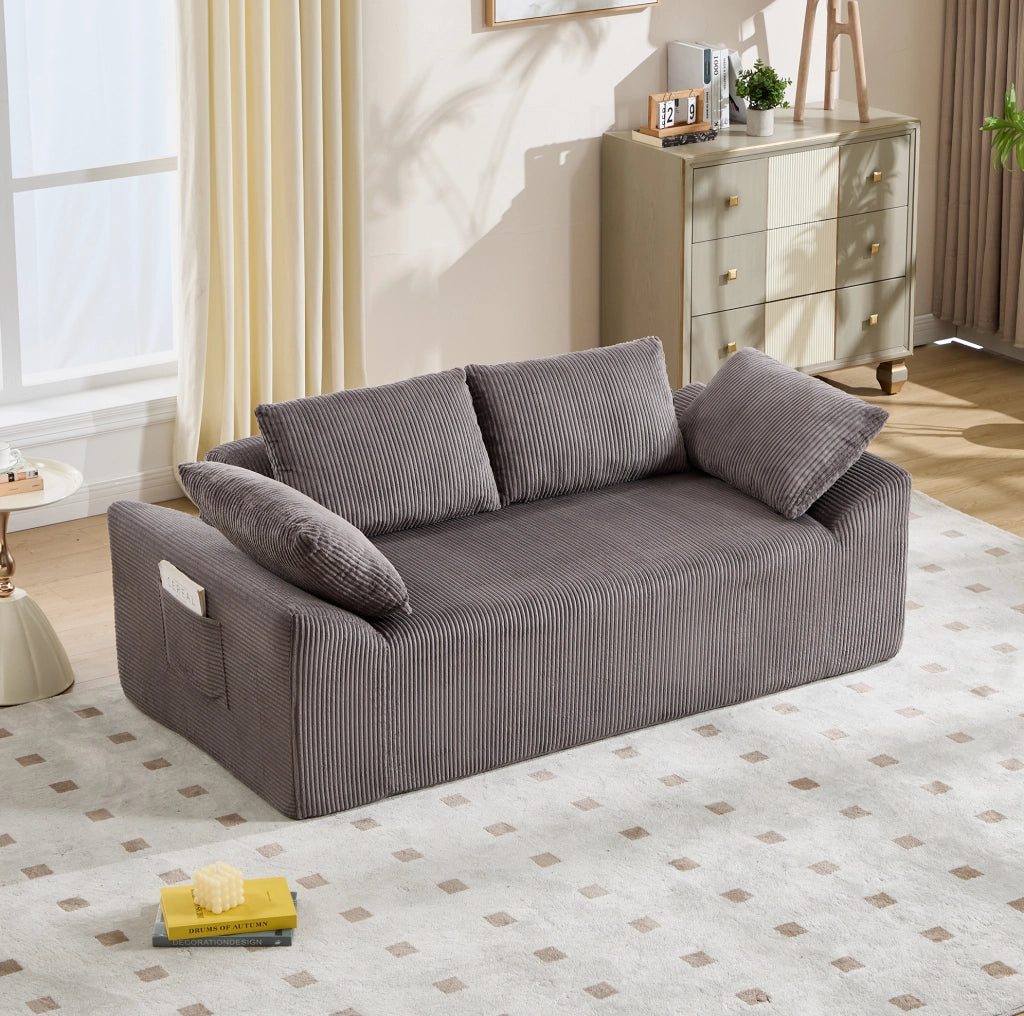 Divano compatto in tessuto con schiuma memory e design senza struttura rigida