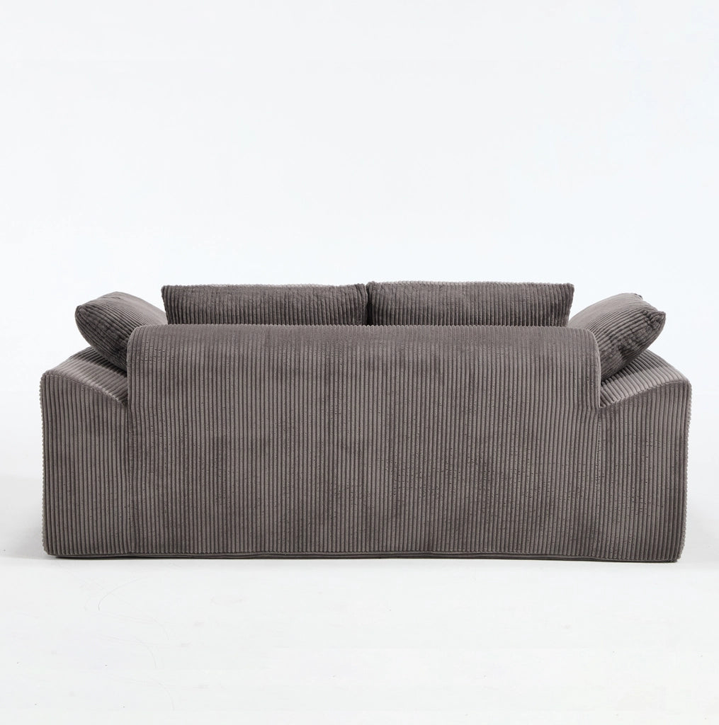 Divano compatto in tessuto con schiuma memory e design senza struttura rigida