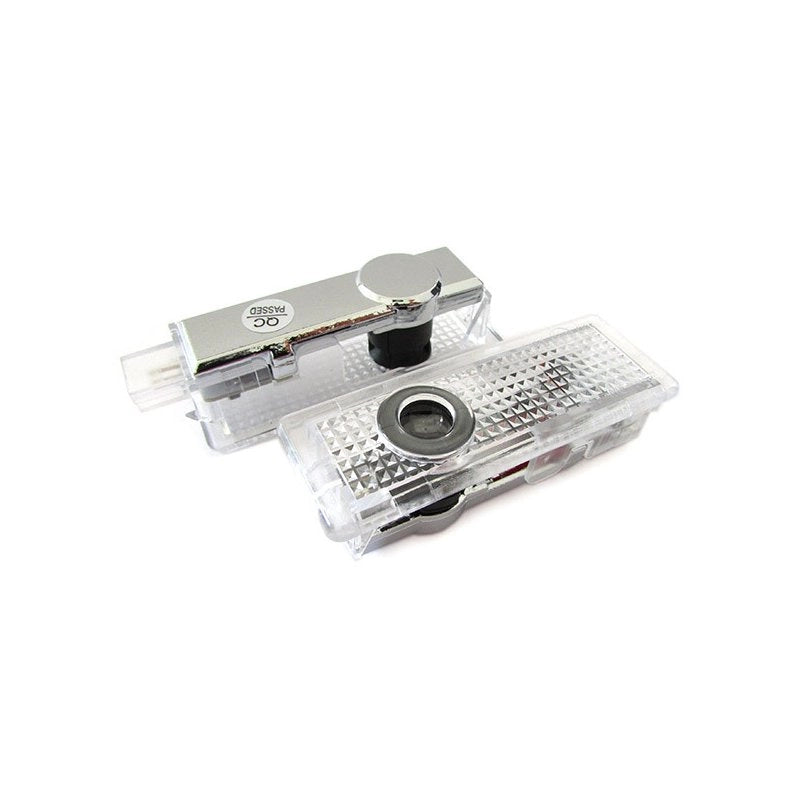 Kit Luci Led Logo Proiettori Auto Portiere BMW E60 E61 E63 E65 E66 E67 E68 E70 E71 E81 E83 E84 E85 E86 E87 E88 E90 E92 E93 F10 F01 F02
