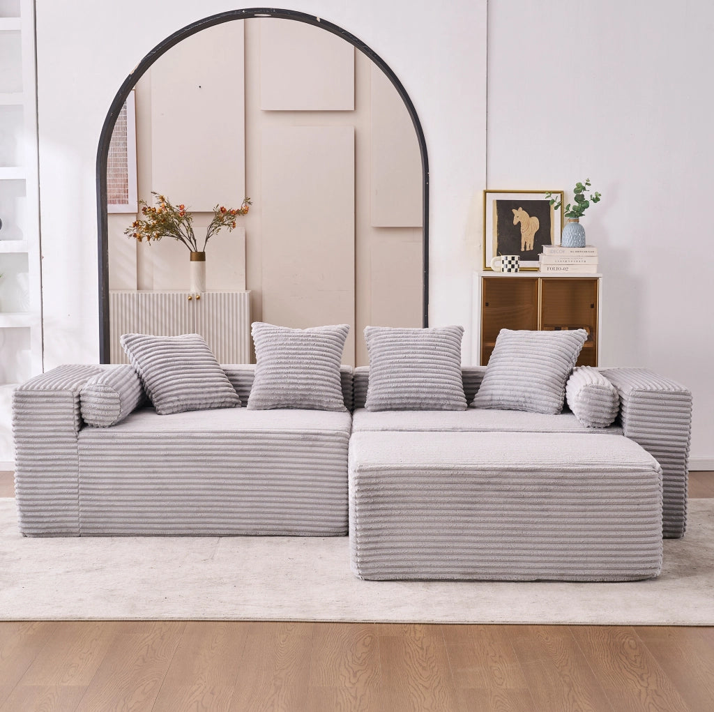 Divano componibile a L con chaise longue; 3 elementi indipendenti; grigio
