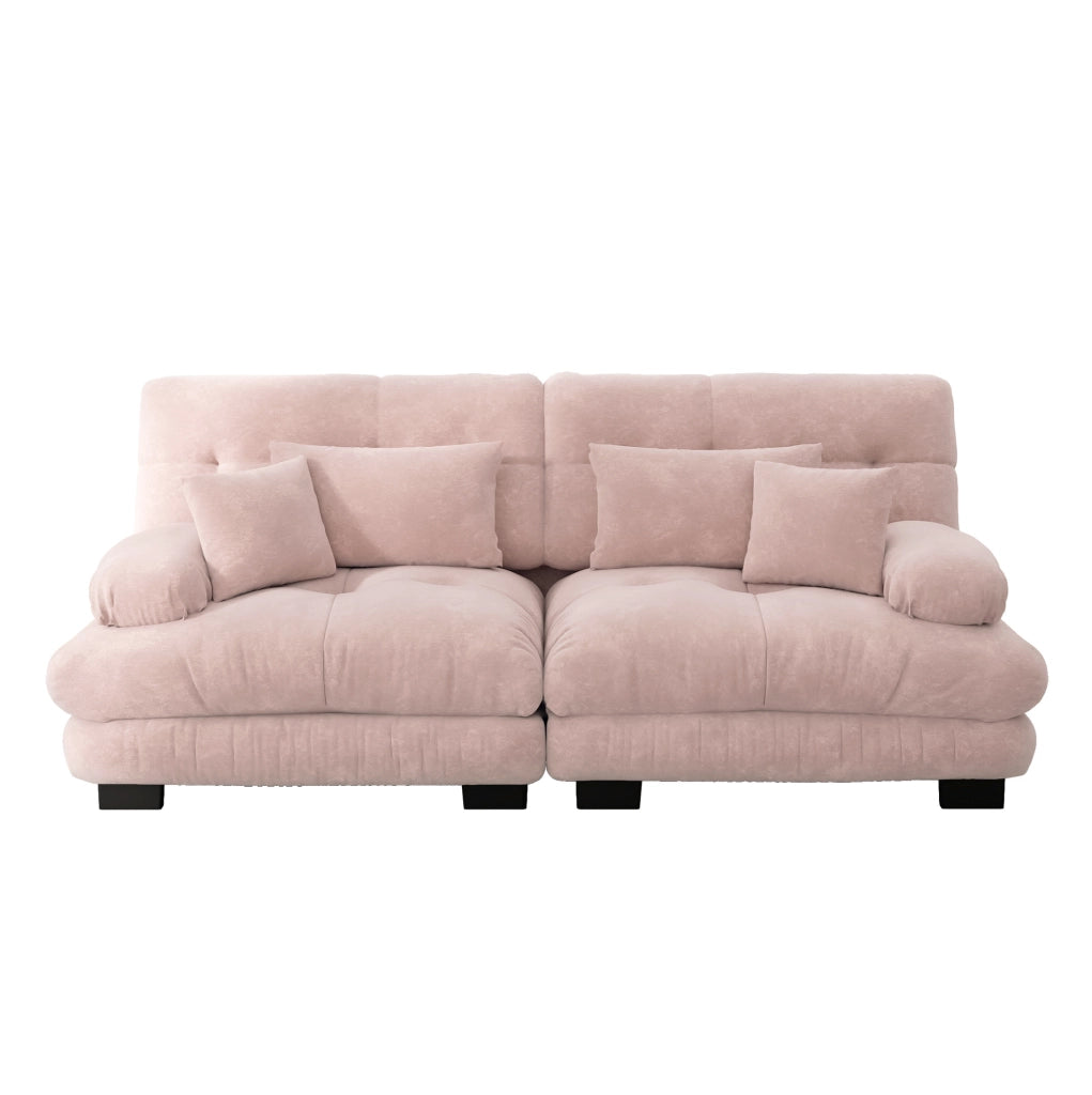 Divano modulare in ciniglia rosa con cuscini lombari e decorativi