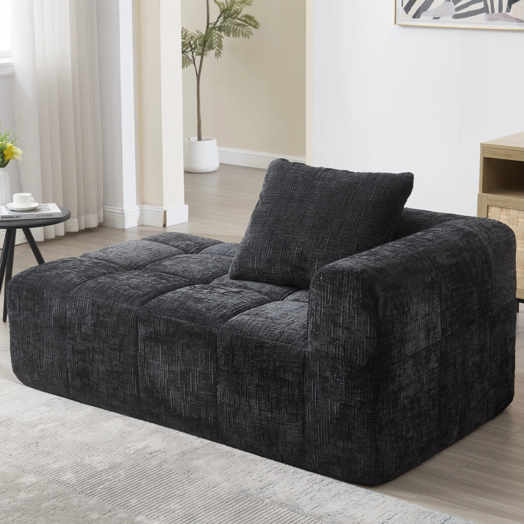 Divano chaise longue 158x90x60 cm in ciniglia nera con tasche laterali e cuscino