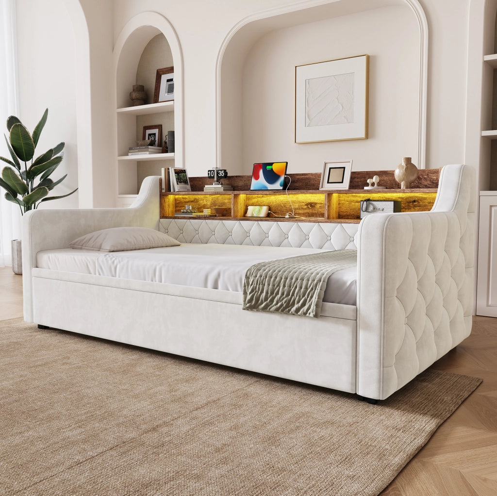 Divano letto 90x190 cm in velluto beige con contenitore in legno, illuminazione LED, prese USB e Type-C, rete a doghe e braccioli