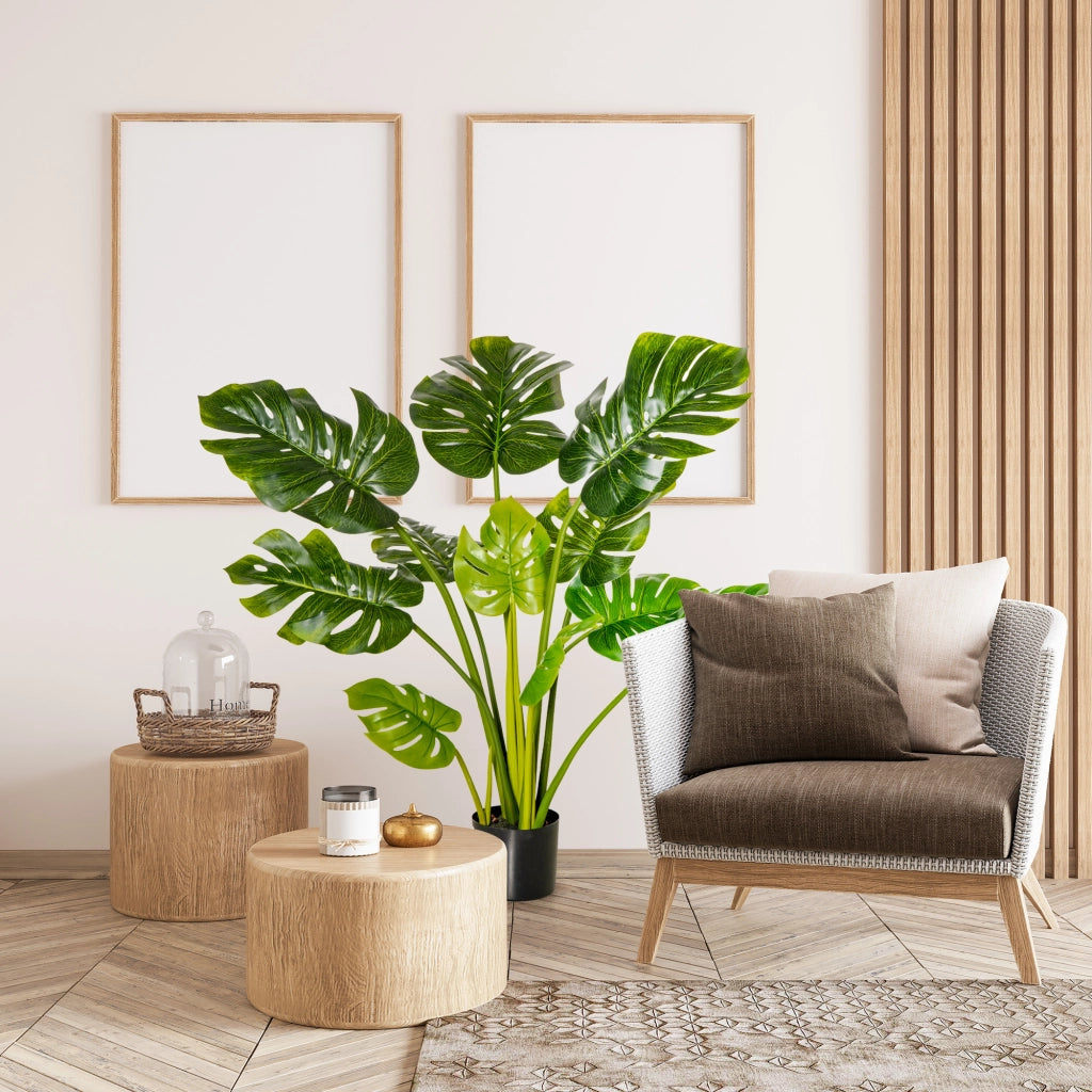 Pianta artificiale monstera da interno e esterno con 11 foglie realistiche vaso nero e base in cemento alta 110 cm