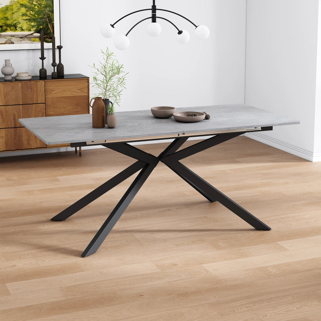 Tavolo da pranzo allungabile in MDF nero e grigio con gambe incrociate, versatile e moderno