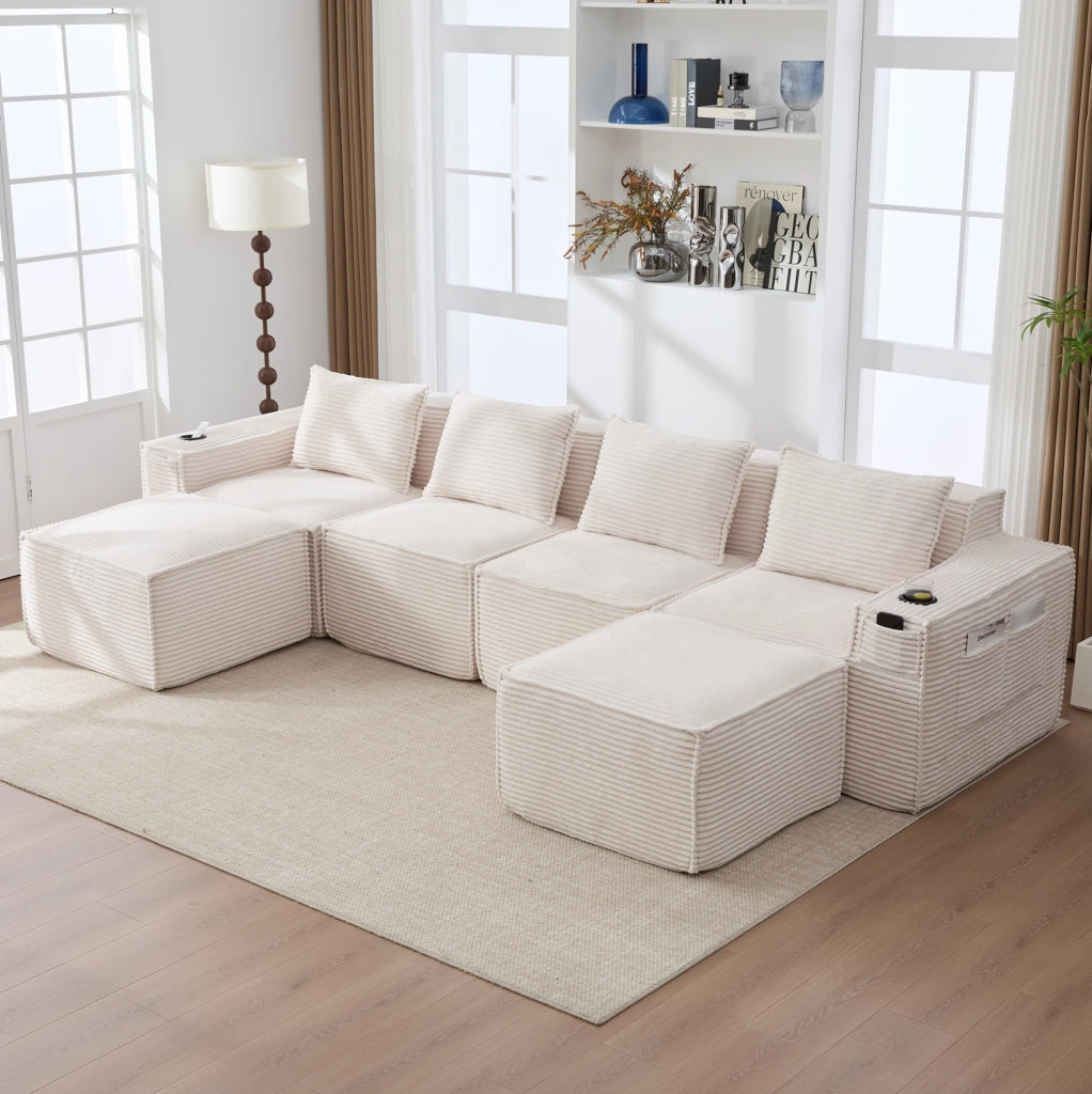 Divano modulare beige in velluto a coste con pouf e portabicchieri