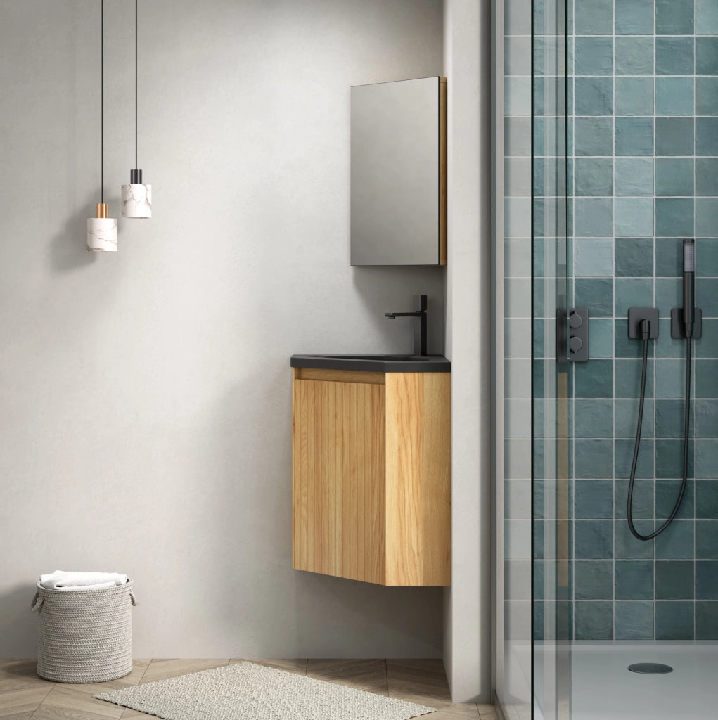 Mobile bagno angolare ULEVR con lavabo triangolare integrato in resina nera opaca e anta effetto rovere