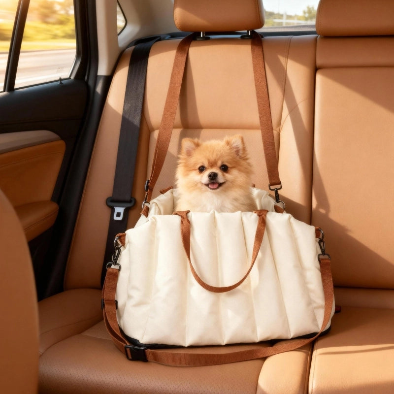 Seggiolino auto per cani con due cinghie regolabili; base antiscivolo e borsa da trasporto color crema