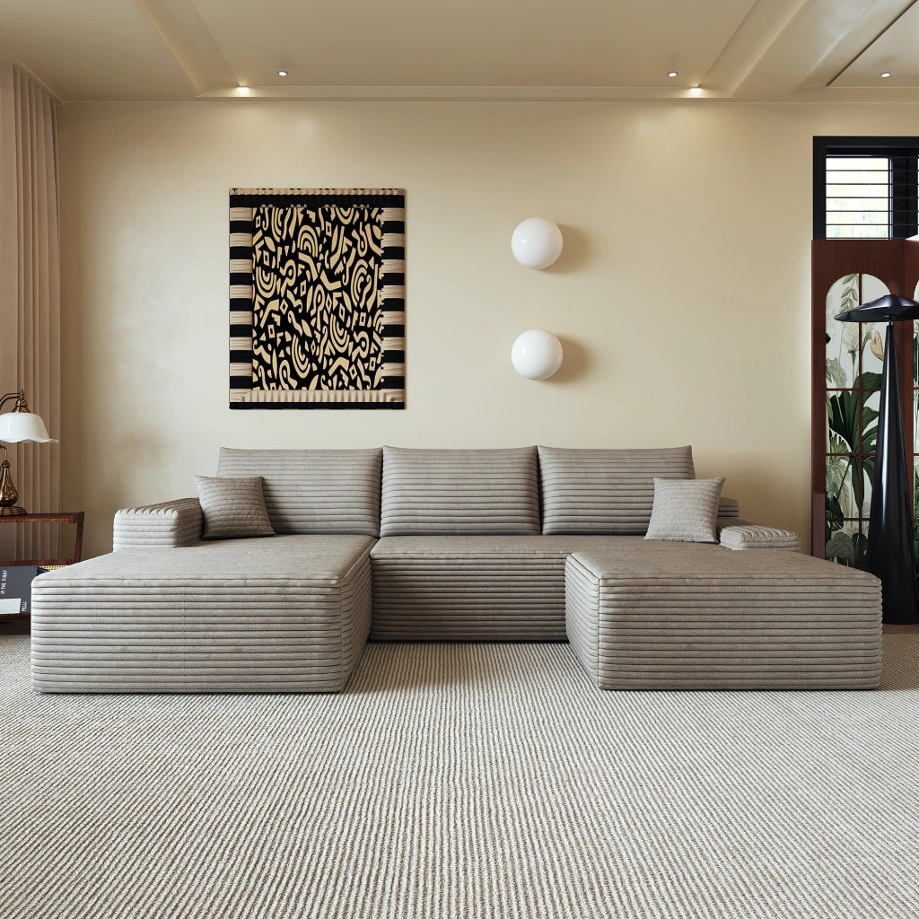 Divano angolare modulare con chaise longue e seduta profonda, imbottito in tessuto a coste color cammello