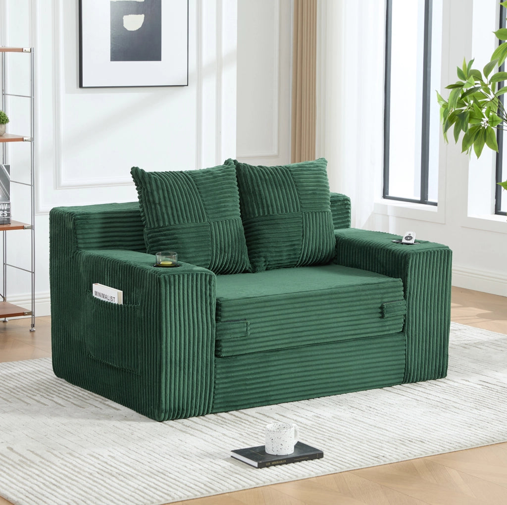 Pouf divano in velluto a coste verde smeraldo con tasche laterali; 151 x 133 x 64 cm
