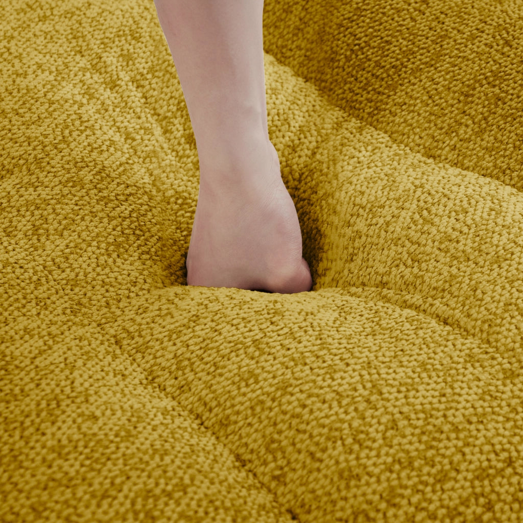 Divano modulare angolare 4 posti con ottomana, seduta profonda e braccioli ergonomici in pile granulato giallo