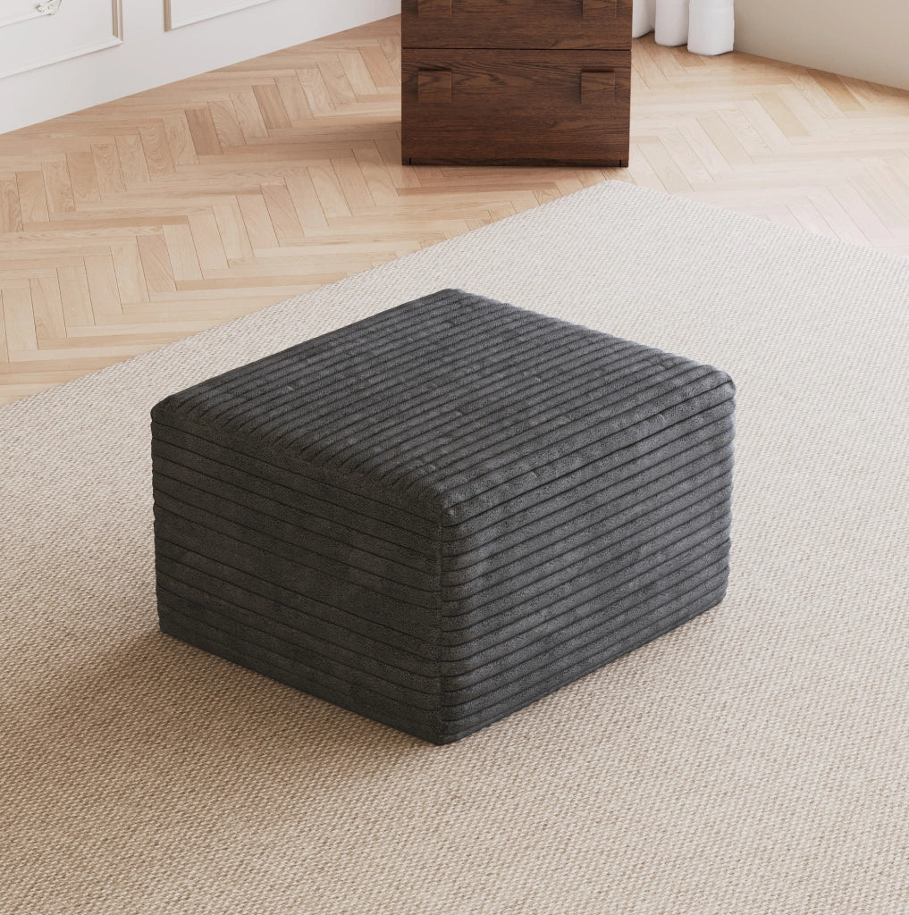 Pouf imbottito in velluto a coste grigio scuro