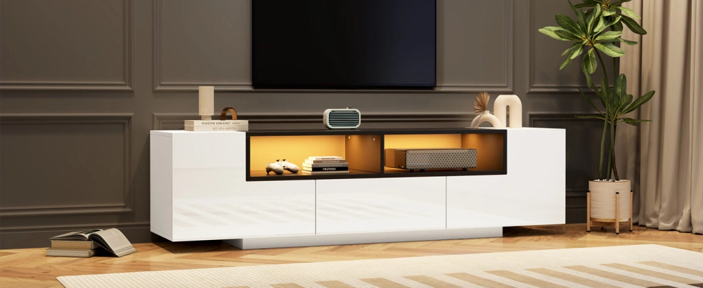 Mobile TV 180x40x48 cm, bianco lucido e nero, con LED, cassetti e design a L. Per TV fino a 75 pollici.