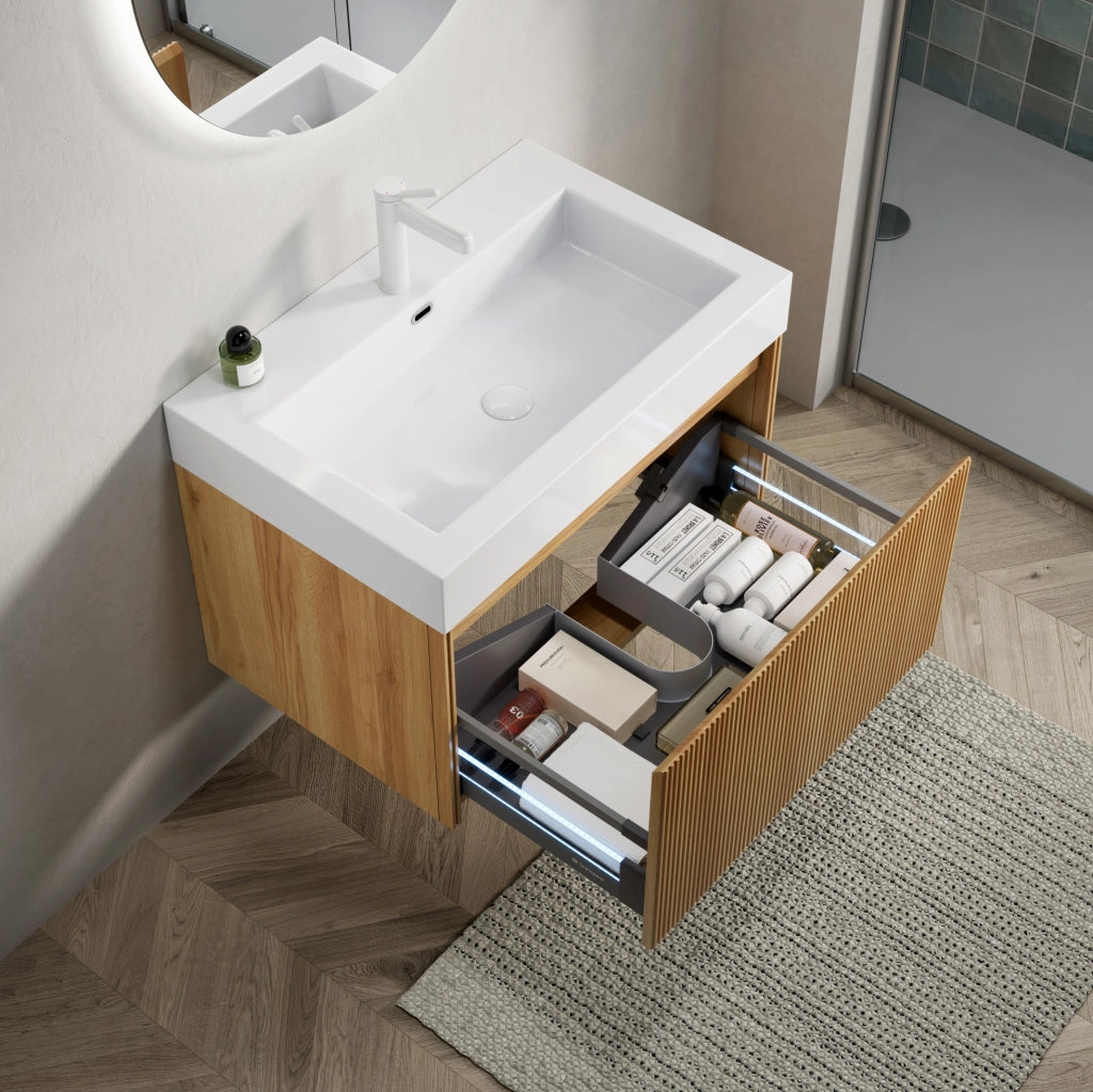 Mobile bagno sospeso 70 cm con lavabo integrato in resina bianca e corpo in compensato effetto quercia naturale