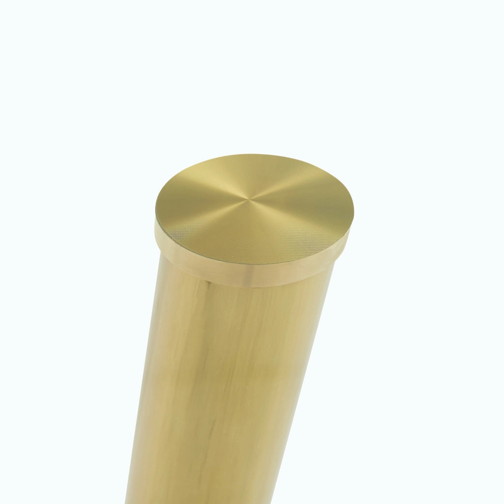 Tavolo da pranzo rotondo in vetro temperato con gambe in metallo color oro design per sala da pranzo
