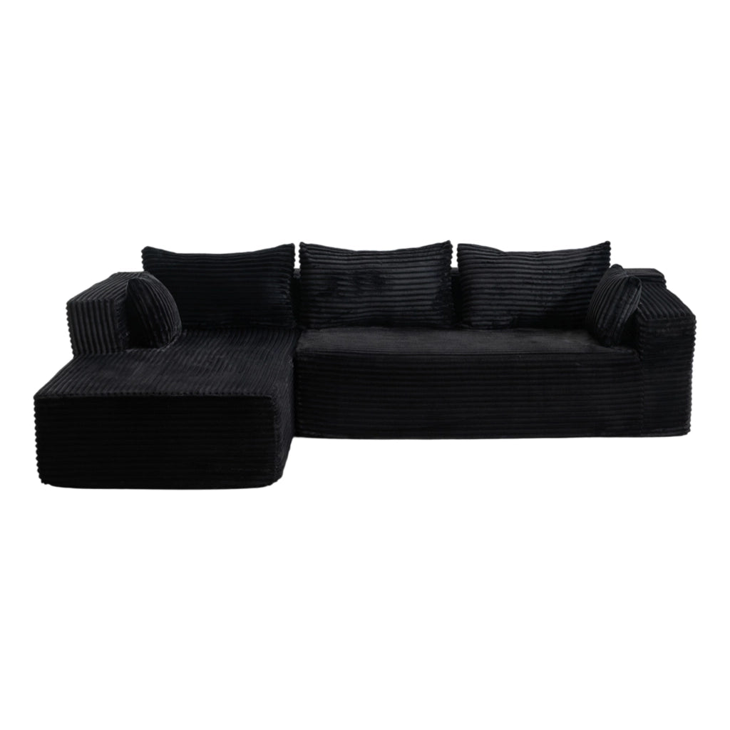Divano modulare a L in due elementi; con chaise longue e seduta profonda; in velluto a coste nero