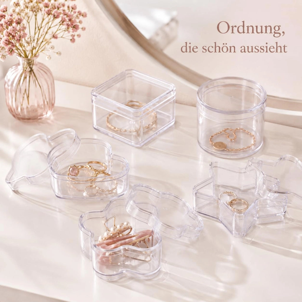Set di 5 contenitori trasparenti, di diverse forme, con coperchio