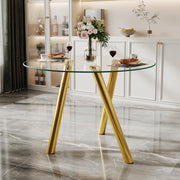 Tavolo da pranzo rotondo in vetro temperato con gambe in metallo color oro design per sala da pranzo