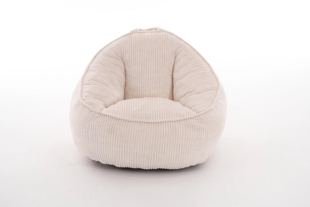 Pouf per bambini in velluto a coste beige con forma curva ergonomica per gioco lettura e relax