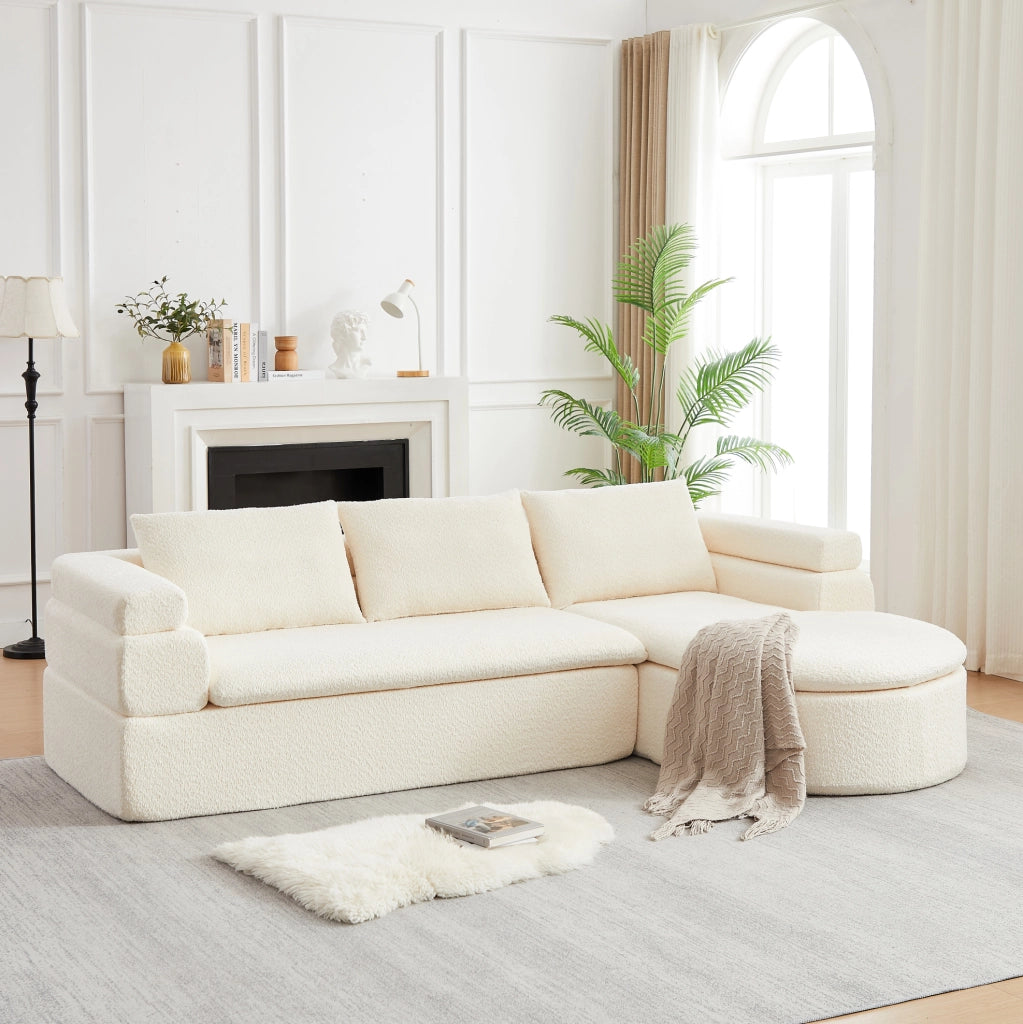 Divano angolare in ciniglia beige con penisola arrotondata