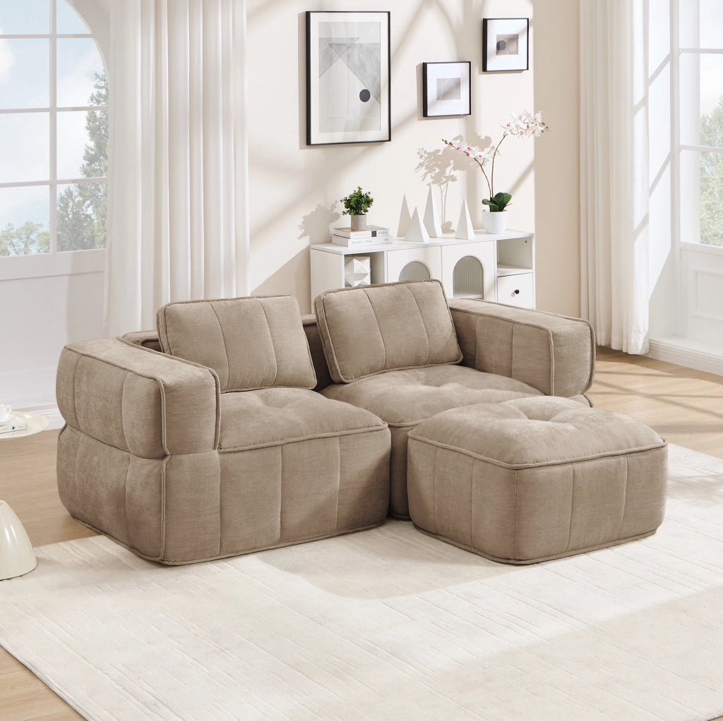 Divano modulare a due posti con pouf color sabbia