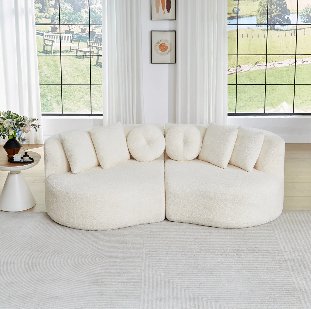 Divano modulare a 2 elementi in ciniglia beige; forma curva con schienale continuo e 6 cuscini