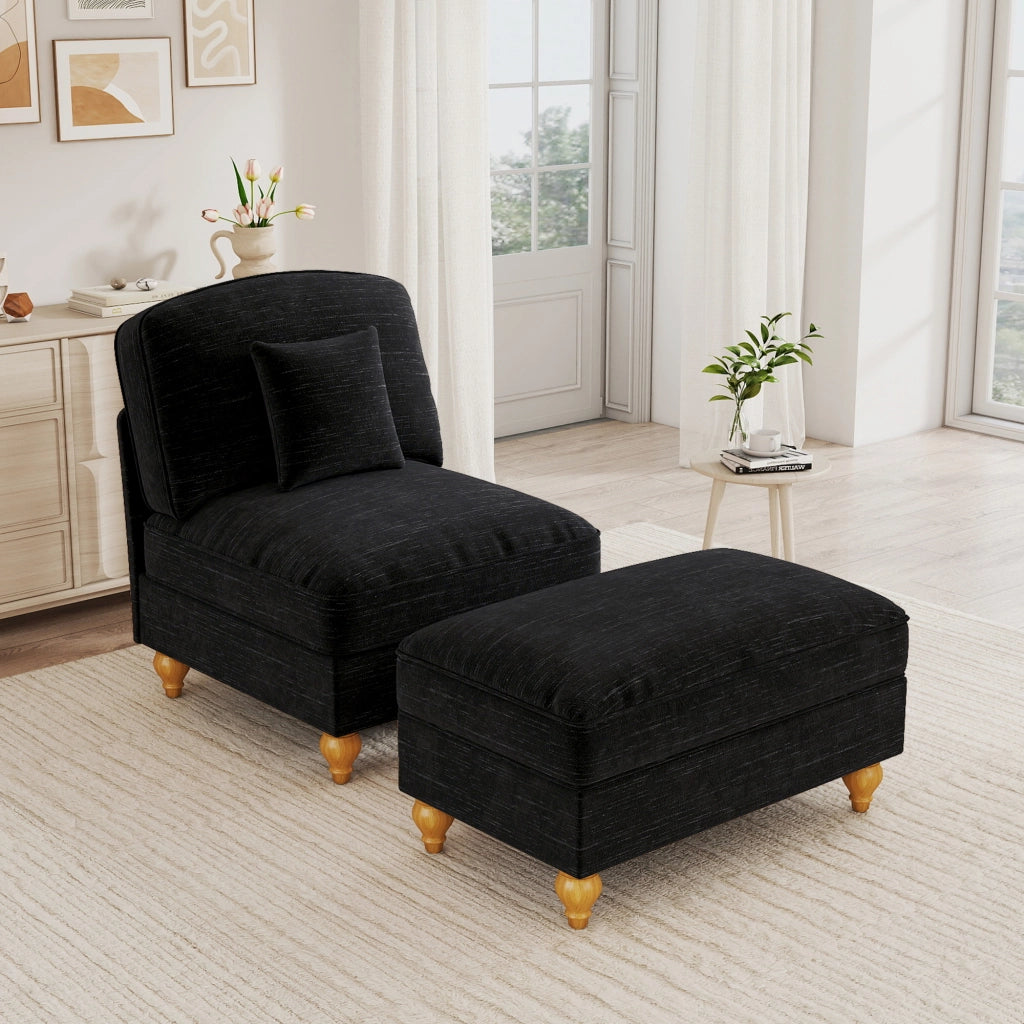 Poltrona in ciniglia nera con pouf mobile; gonne con volant rimovibili; schienale segmentato e cuscino di supporto