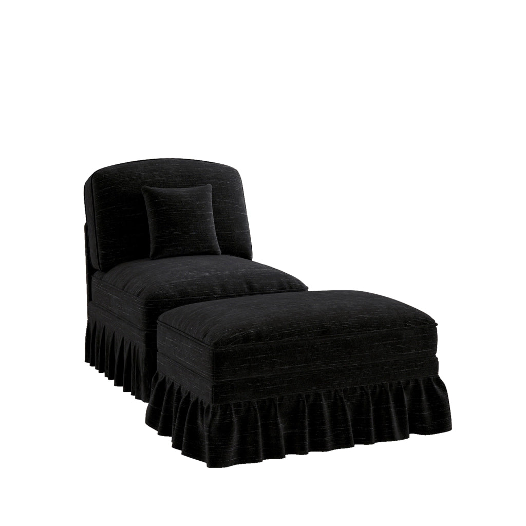 Poltrona in ciniglia nera con pouf mobile; gonne con volant rimovibili; schienale segmentato e cuscino di supporto