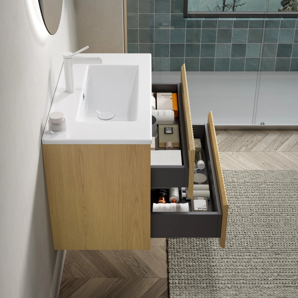 Mobile bagno sospeso 75 cm con lavabo integrato in ceramica; 2 cassetti con chiusura ammortizzata; rovere dorato e bianco