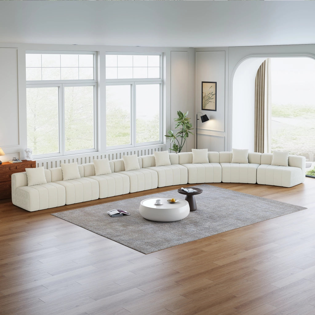 Modulo per divano curvo con 2 cuscini in ciniglia beige