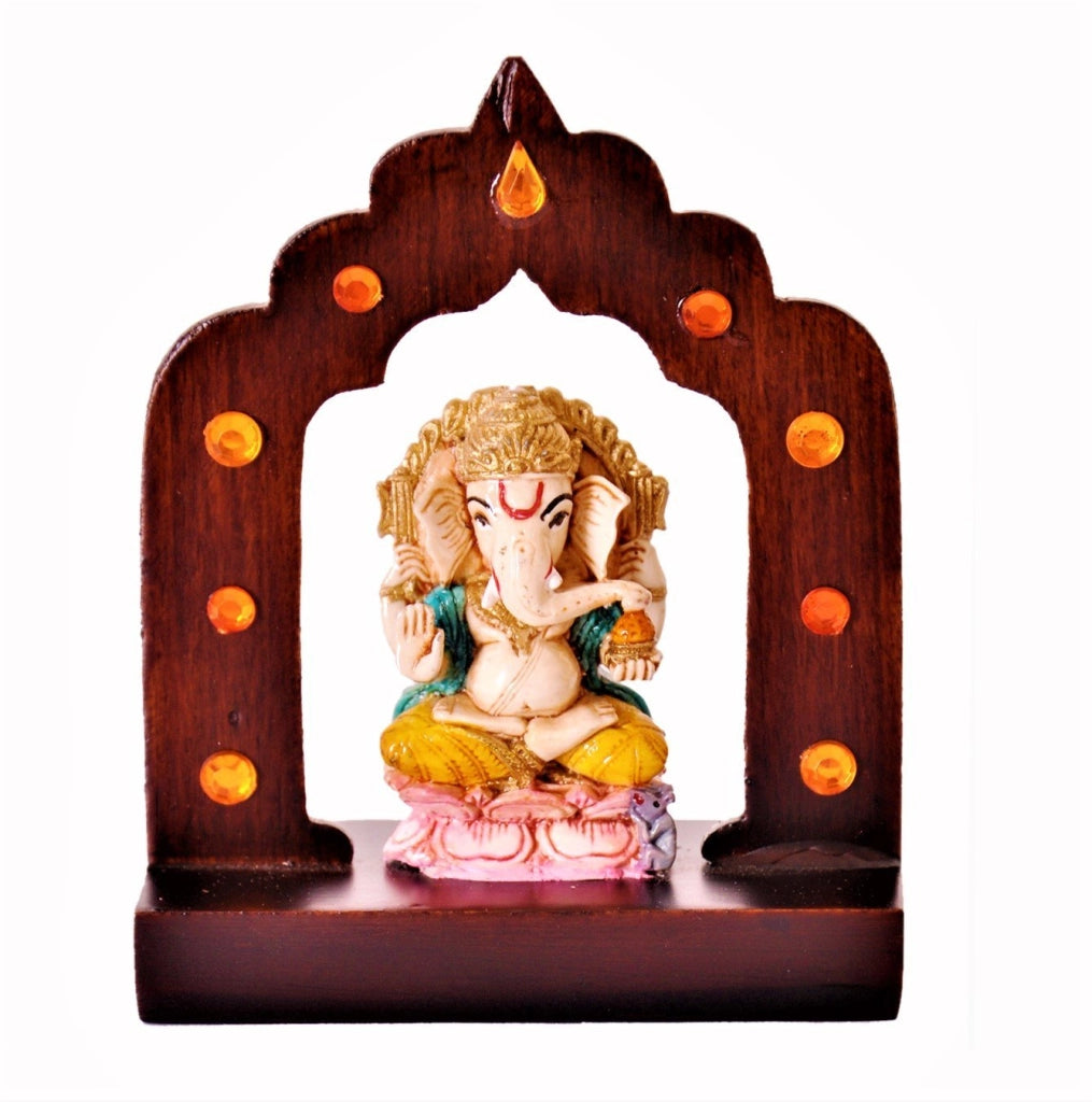 Statua di Ganesha, realizzata in Vetroceramica, raffigurata sotto un arco di tempio, dimensioni 4x3,5x1,5 cm