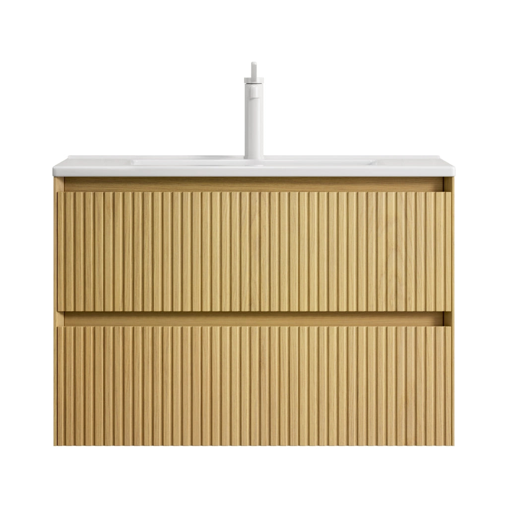 Mobile bagno sospeso 75 cm con lavabo integrato in ceramica; 2 cassetti con chiusura ammortizzata; rovere dorato e bianco