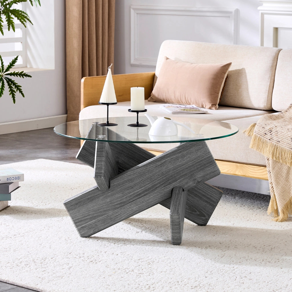 Tavolino rotondo 79 cm in MDF grigio e vetro trasparente, design incrociato