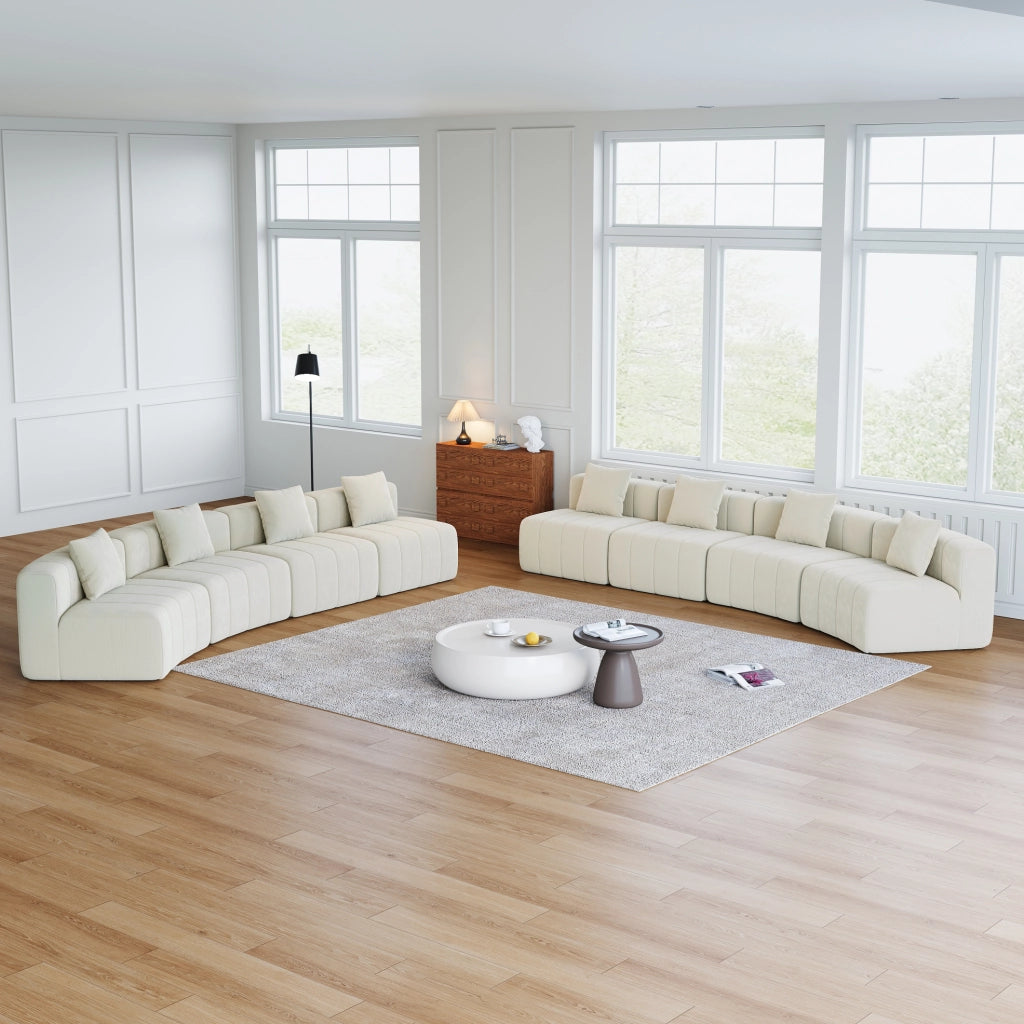 Modulo divano curvo beige in ciniglia con due cuscini