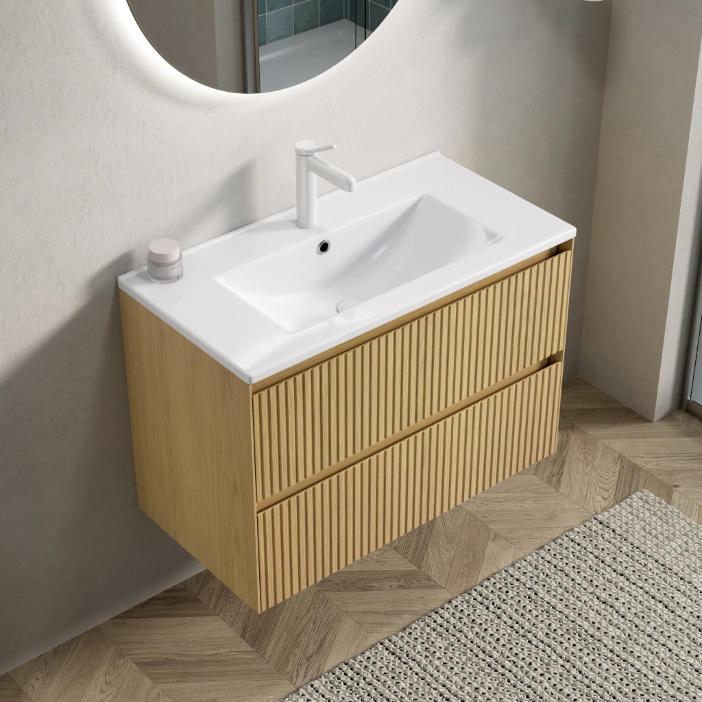 Mobile bagno sospeso 75 cm con lavabo integrato in ceramica; 2 cassetti con chiusura ammortizzata; rovere dorato e bianco