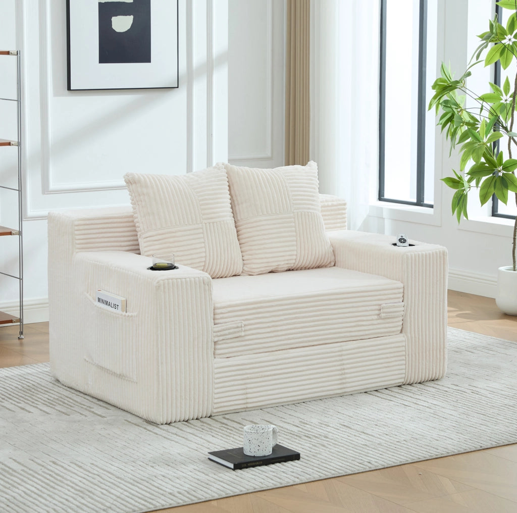 Divano in velluto a coste beige con tasche laterali e due cuscini