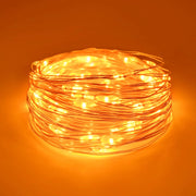 Catena luminosa da 5 metri, con 50 LED arancioni, alimentata a batteria, per uso interno