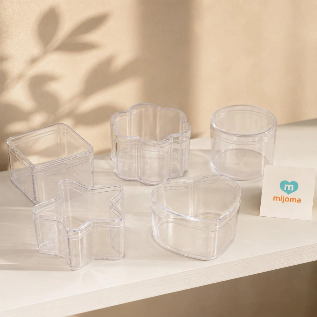 Set di 5 contenitori trasparenti, di diverse forme, con coperchio