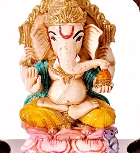 Statua di Ganesha, realizzata in Vetroceramica, raffigurata sotto un arco di tempio, dimensioni 4x3,5x1,5 cm