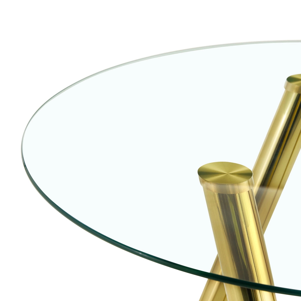Tavolo da pranzo rotondo in vetro temperato con gambe in metallo color oro design per sala da pranzo