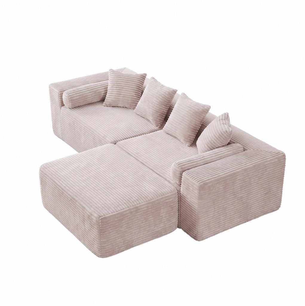 Divano modulare beige a tre elementi con chaise longue