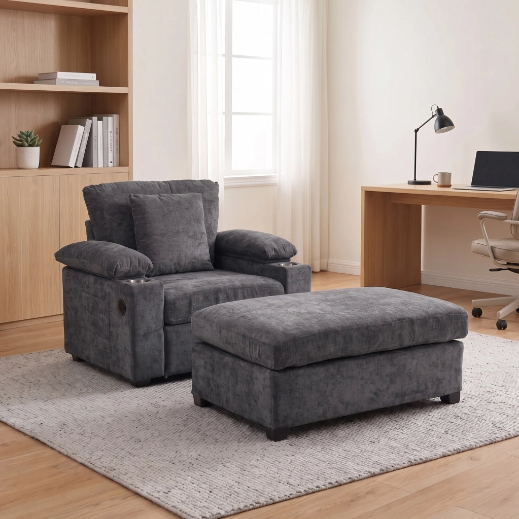 Poltrona trasformabile grigio scuro con pouf, vano portaoggetti e presa USB