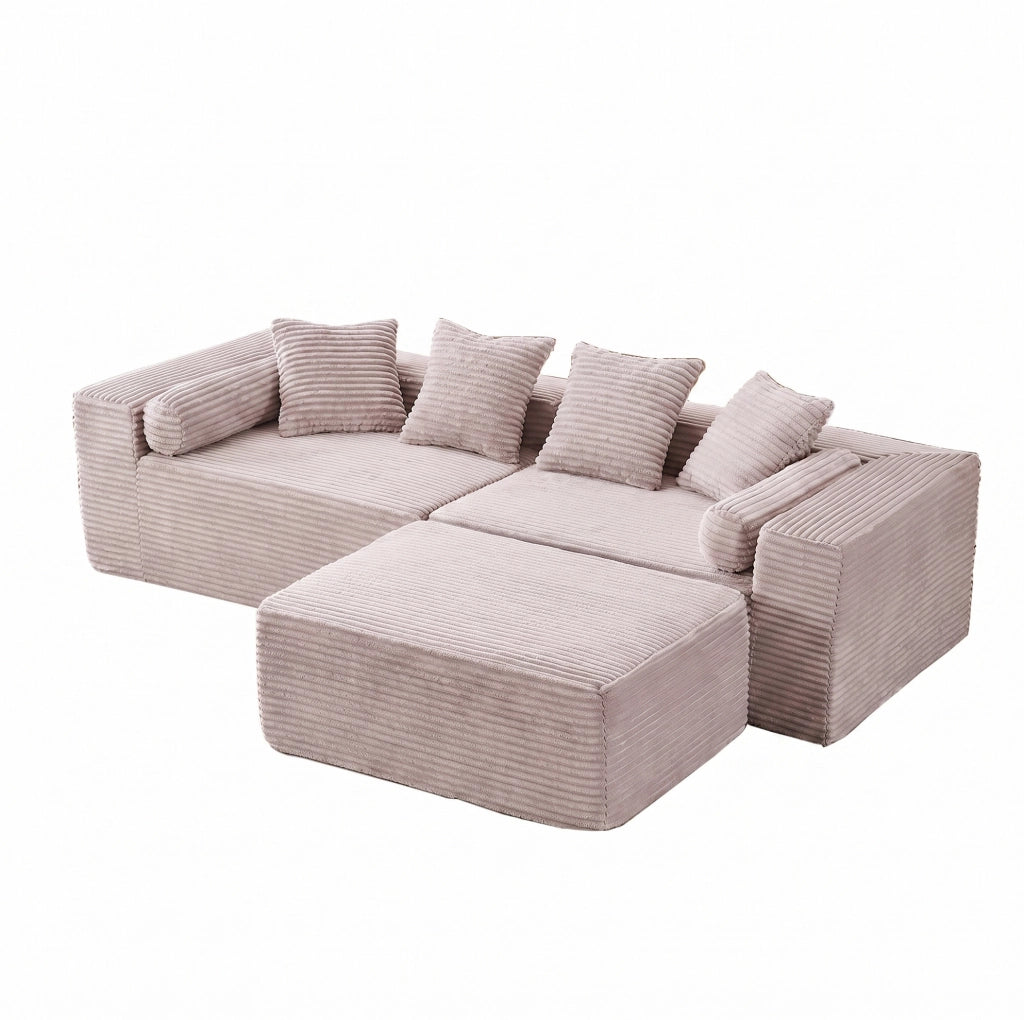 Divano modulare beige a tre elementi con chaise longue