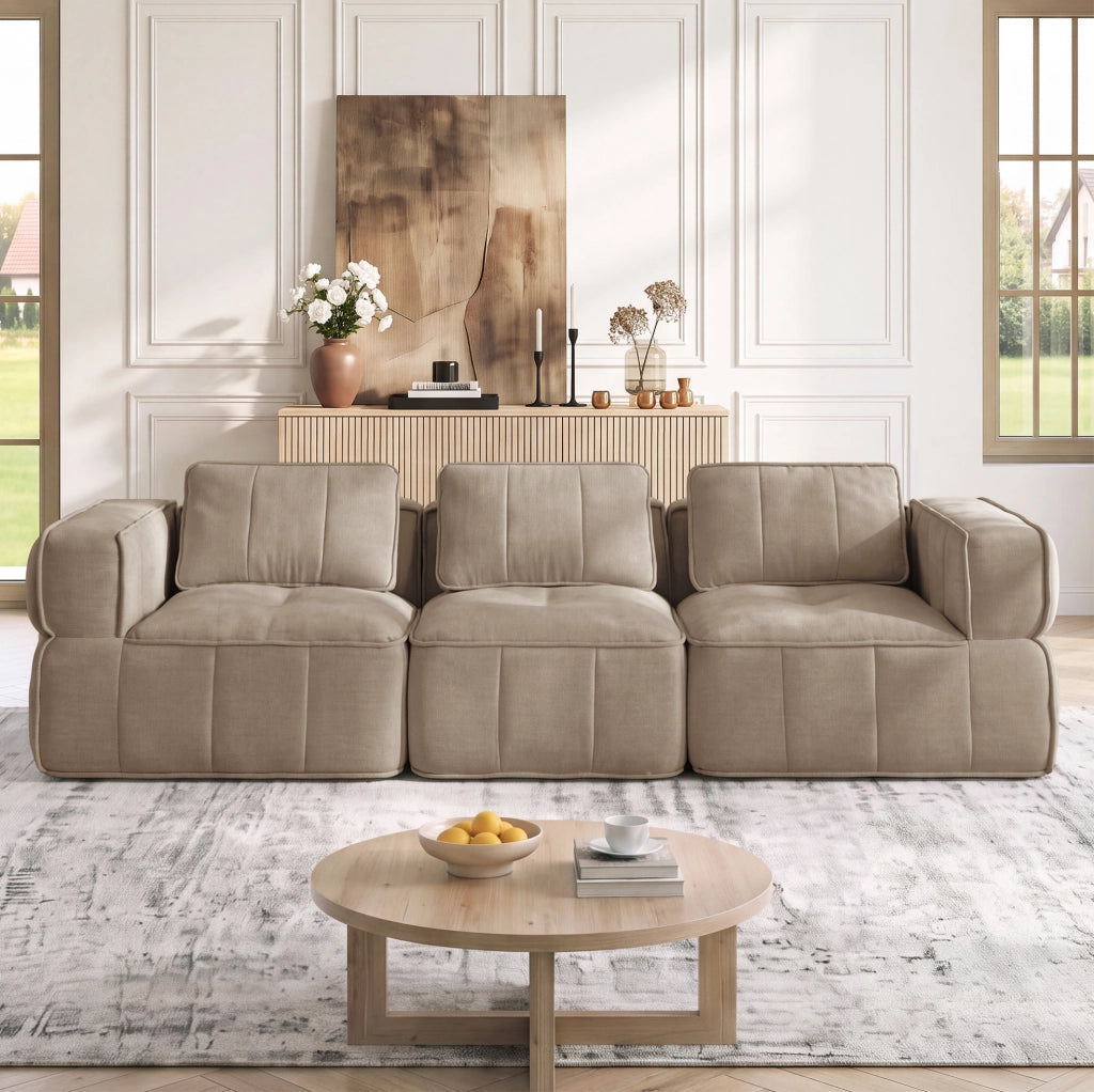 Divano modulare in poliestere color sabbia con pouf