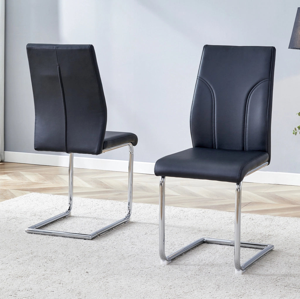 Sedie con rivestimento nero in similpelle e gambe argentate
