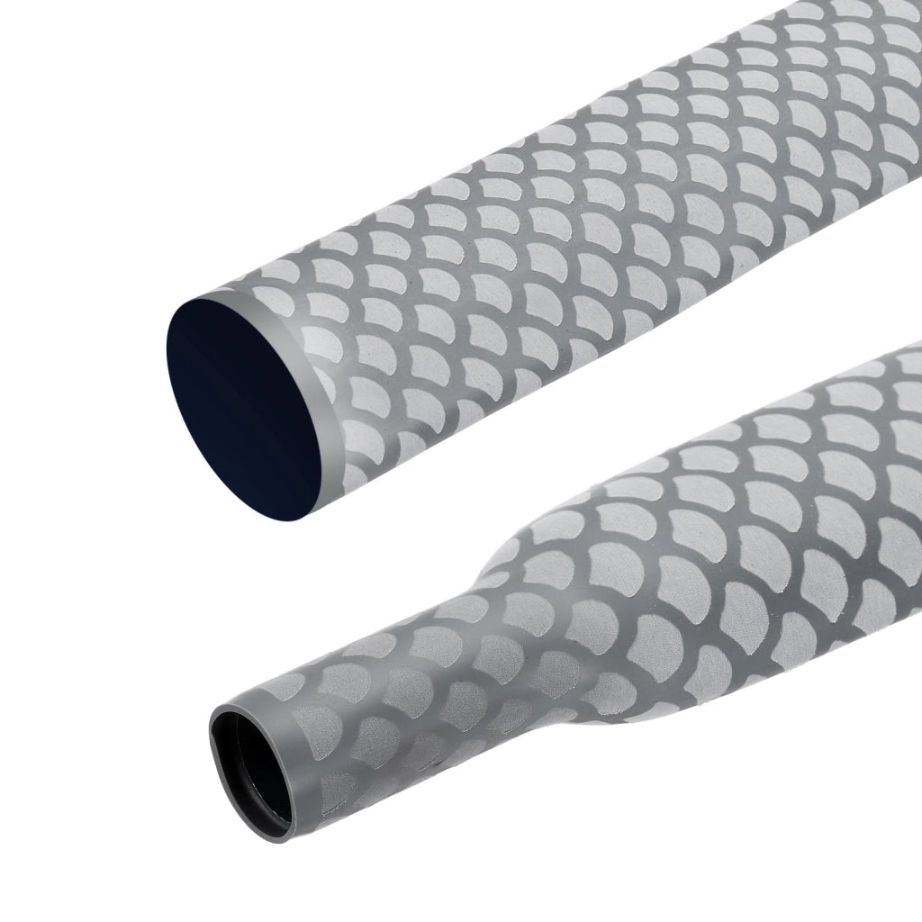 Tubo termorestringente, 1 metro, diametro 35 mm, rapporto di restringimento 1,8:1, colore grigio, motivo a squame di pesce